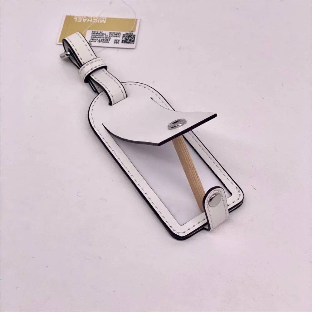 Michael Kors White and Pink Luggage Tag